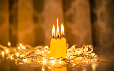 burning candles on a dark background