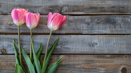 Pink tulip bouquet on wooden backdrop Greeting card for Easter or Mother s Day Ample space for writing
