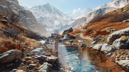  Boulder strewn pathway meanders alongside crystal clear mountain stream flanked by barren terracotta slopes and a hint of snow against a backdrop of clear skies © 2rogan