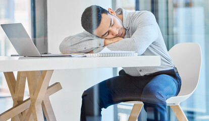 Man, sleeping and tired in office at startup with burnout, exhausted and overworked at creative agency. Employee, person and rest with fatigue, overtime and overwhelmed with nap at desk in workplace - Powered by Adobe