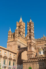 Fototapeta na wymiar Palermo, Sicily, Italy. Palermo Cathedral - Church of the 12th century. with four bell towers and royal tombs. Sunny summer day