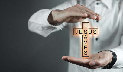 Man showing Christian cross. Jesus Saves. Religion. Love - 791337203