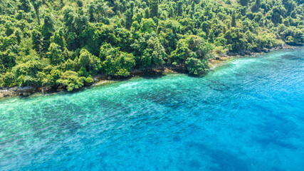 Aerial view of islands, Andaman Sea, natural blue waters and forests, tropical sea of Thailand....