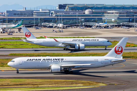 Japan Airlines JAL Boeing and Airbus airplanes at Tokyo Haneda Airport in Japan