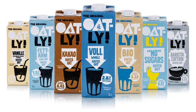 Oatly vegan oat milk different flavors isolated on a white background