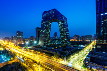 Beijing central business district CBD skyline with China Central Television CCTV headquarters at night in Beijing, China
