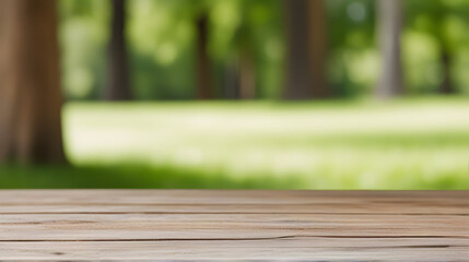 Wooden table on grass in a sunlit park with blurred nature background