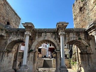 Fototapeta premium Collage of famous landmarks: Hadrian's Gate old town Kaleici district in popular resort city Antalya, Turkey