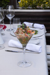 Lobster salad cocktail served in a martini glass - 791378495