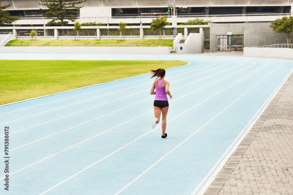 Poster Back, woman and running on race track for athletics, fitness or competition training in stadium. Runner, exercise and female person for sports performance, endurance challenge or cardio workout