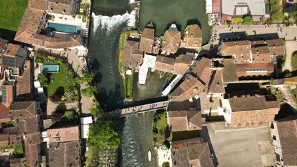 Aerial view of the cascade on the Mincio river, a picturesque place in Italy. Village of Borghetto...