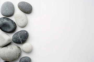 Flat lay composition with spa stones and space for text on white background., with empty copy space