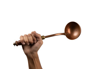 Black male hand holding a brass vintage kitchen ladle isolated no background