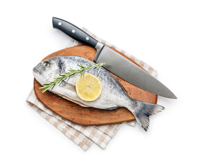 Fresh sea bream fish, rosemary and lemon on cutting board isolated on white background. - 791405288