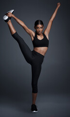 Indian woman, portrait and leg stretching or flexible challenge in studio for mobility, pilates or...