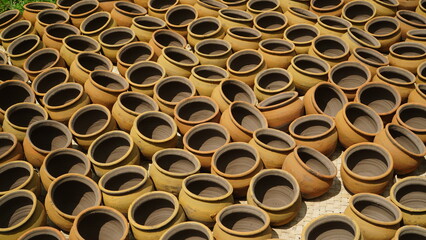 pottery is being dried in the sun