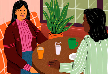 Businesswoman discussing with colleague at cafe