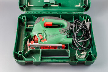 plastic box with an electric fretsaw