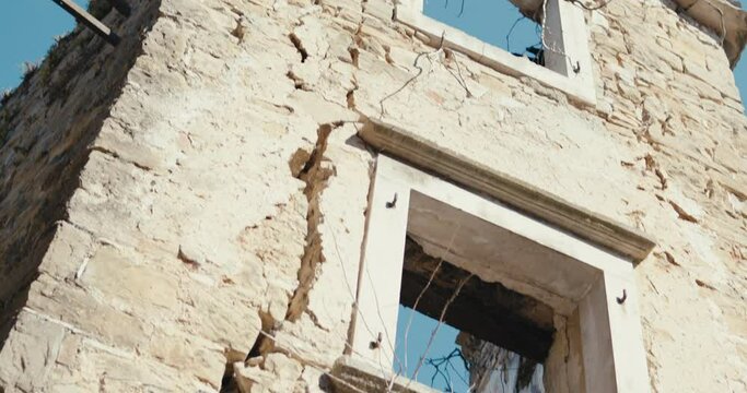 Abandoned facade mediterranean stone house building wall in tilt up