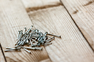 Close up carpentry shiny metal nails