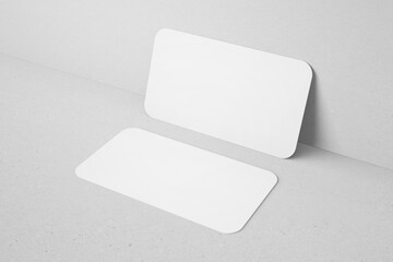 blank minimal clean 90x50mm us size horizontal brand identity business name card with round corner leaning to wall realistic mockup design template 3d render illustration