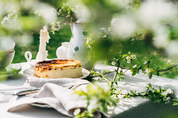 Fototapeta premium Sunrise view of breakfast with Basque Cheesecake in the countryside