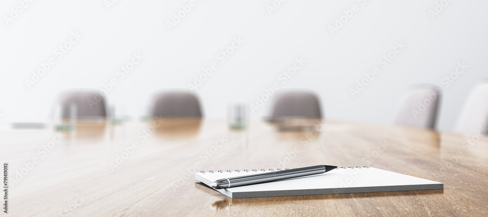 Poster Close up of wooden conference table with empty notepad and pen for morning notes. Blurry chairs on wide background. Business meeting concept. Mock up place, 3D Rendering.