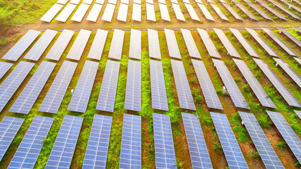 Harnessing sunlight to power communities, solar farms epitomize sustainability, transforming clean energy into a brighter future.
 - obrazy, fototapety, plakaty