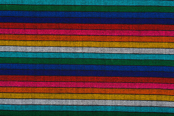 Colorful typical mexican tablecloths. Textile background, texture.