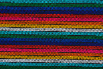 Colorful typical mexican tablecloths. Textile background, texture.
