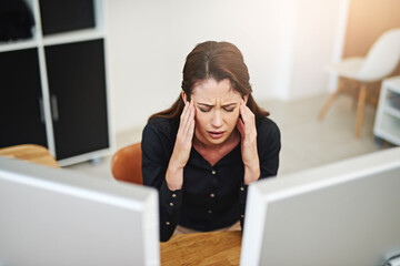 Business woman, computer and headache in office for information technology, software or online...