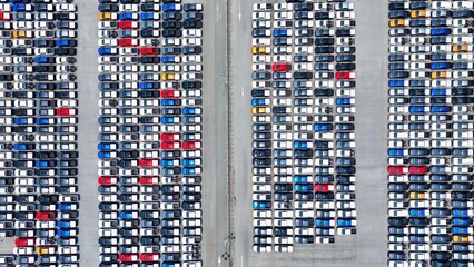 Behold, a masterpiece of organization, as rows of vehicles create a mesmerizing gridlocked grandeur, transforming mundane parking into an art form of symmetrical beauty.
