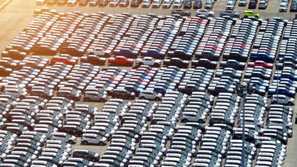 Behold the bird's-eye view of the automotive realm, where cars align flawlessly like soldiers in formation. This panorama epitomizes the disciplined approach prevalent in the industry.
