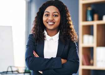 Arms crossed, portrait or black woman with smile in a law firm for consulting, legal advice and...