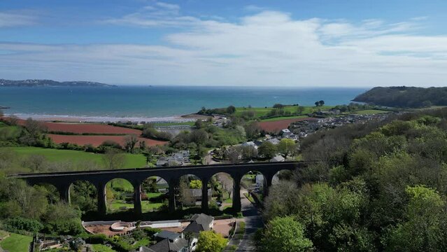 Broadsands, South Devon, England: DRONE VIEWS: A railway viaduct designed by Isambard Kingdom Brunel dominates the Broadsands area. The Torbay Steam Railway line is a major UK tourist attraction.