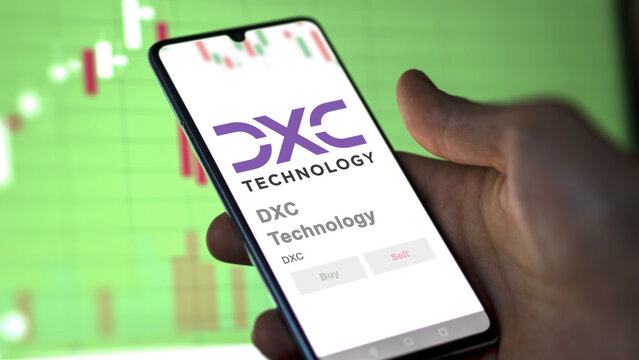 April 09th 2024 , Tysons Corner, Virginia. Close up on logo of DXC Technology on the screen of an exchange. DXC Technology price stocks, $DXC on a device.