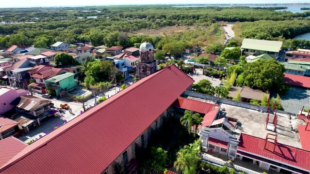Kawit, Cavite, Philippines - Aerial flyby of the Diocesan Shrine and Parish of St. Mary Magdalene along Tirona Highway
