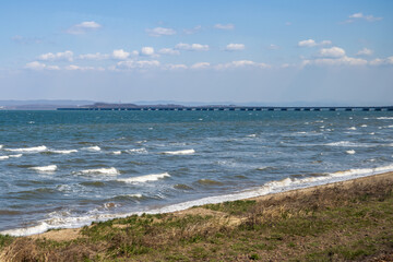 View of the bridge across the Amur Bay, connecting the De Vries Peninsula and the Muravyov-Amursky Peninsula. One of the longest bridges in Russia. Vladivostok, Primorsky Krai, Russian Far East. - 791428200