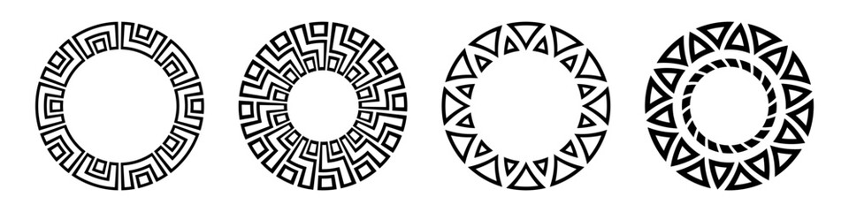 Set of four abstract circular ornaments. Round meanders set. Decorative round patterns isolated on white background. Stencil tattoo and prints. Ethnic motives. Vector monochrome illustration.