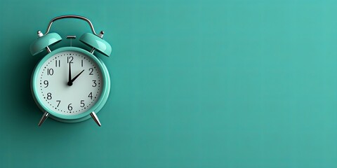 alarm clock on Cyan background Minimalistic flat lay,with copy space for photo text or product, blank empty copyspace banner about time management and selfamplement concept. 