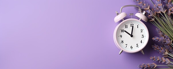 alarm clock on lavender background Minimalistic flat lay,with copy space for photo text or product, blank empty copyspace banner about time management and selfamplement concept.  - obrazy, fototapety, plakaty