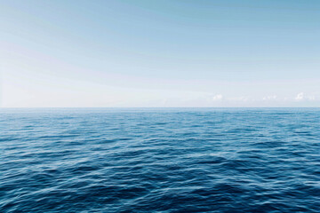 Fototapeta premium The vastness of the ocean stretching out to the horizon, with just the line where the sea meets the sky in the frame.