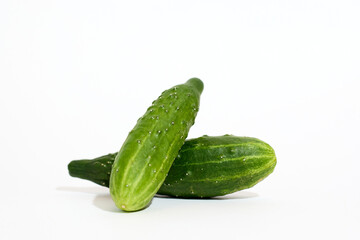 Two Cucumbers Stacked Together