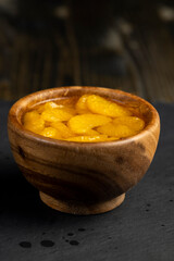 ripe small slices of tangerines in sweet syrup