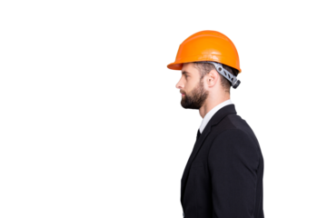 Profile side view half face portrait with copy space, empty place of  virile stylish investor with stubble in orange safety helmet, hardhat and black tux with tie, isolated on grey background
