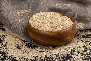 scattered white quinoa seeds, close up
