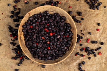 large number of frozen blueberries with red unripe