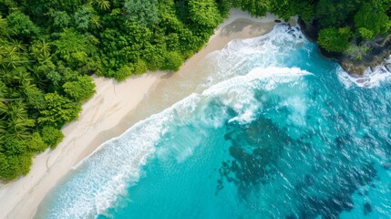 Beautiful beach with turquoise water and waves from above, top view