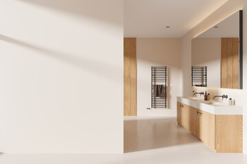 Fototapeta na wymiar Beige hotel modern bathroom interior with double sink and vanity. Mockup wall