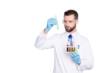 Portrait of busy concentrated scientist with stubble in white lab coat, gloves analysing, looking at  test tubes with multi-colored liquid in his arm, isolated on grey background